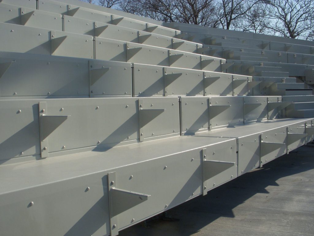 USTA_Court 17 SPS Stadia + Arenas System showing tiered decking and aisle steps Court 17 at USTA Billie Jean King NTC SPS tiered decking system showing aisle steps under construction
