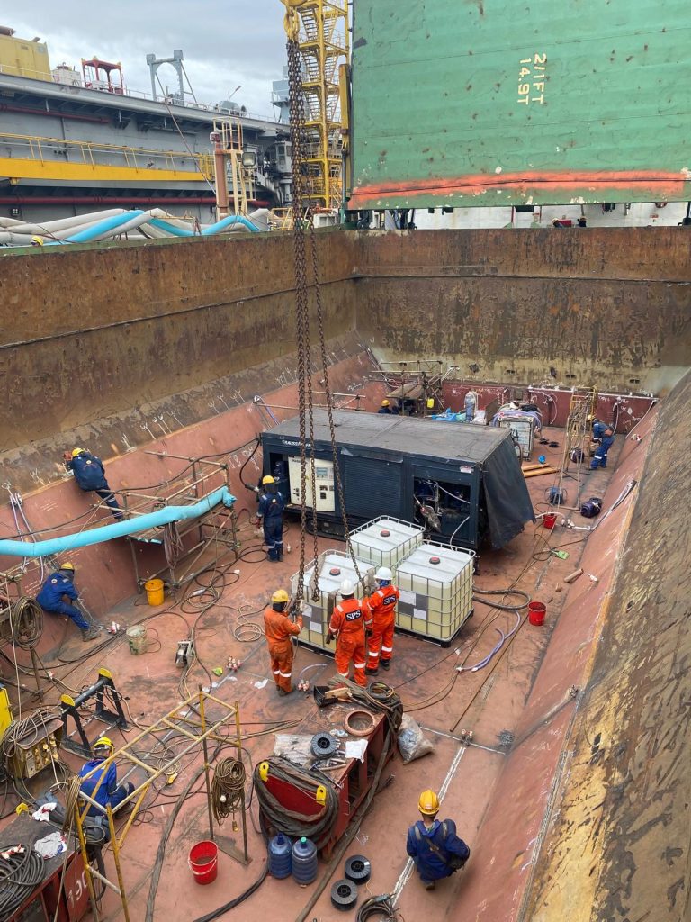 Photo shows SPS Technology and other technicians undertaking cargo hold reinstatement with SPS.