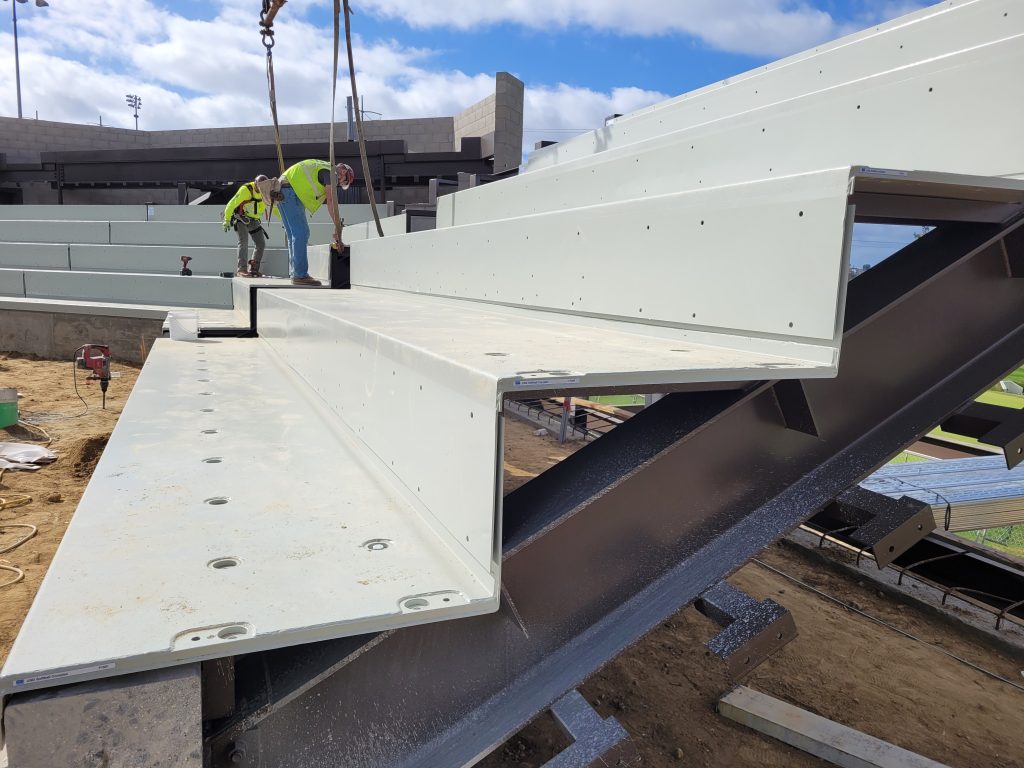 SPS terrace installation at USD softball Side view of SPS terraces being installed at Reggie Smith Softball Complex